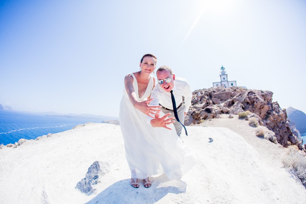 Свадебная церемония Яны & Алексея из Тучково 24.07.2014 года в Греции на о. Санторини, свадебная площадка Andromeda Villas