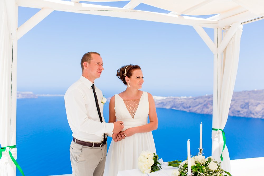 Свадебная церемония Яны & Алексея из Тучково 24.07.2014 года в Греции на о. Санторини, свадебная площадка Andromeda Villas