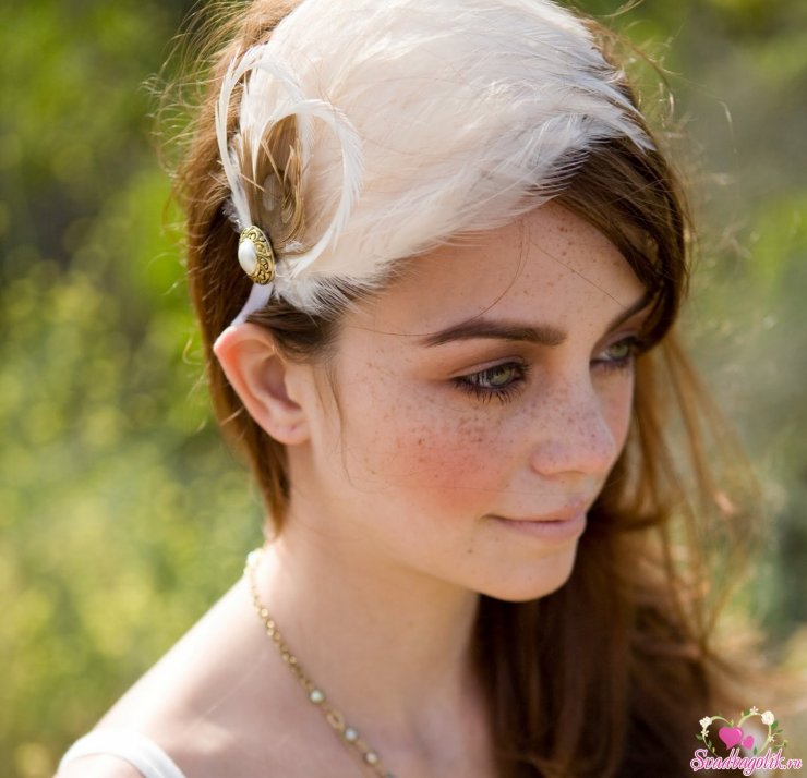 Необычное украшение на голову для невесты из перьев