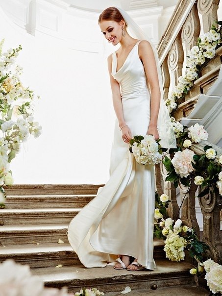 Платье невесты с драпированным лифом