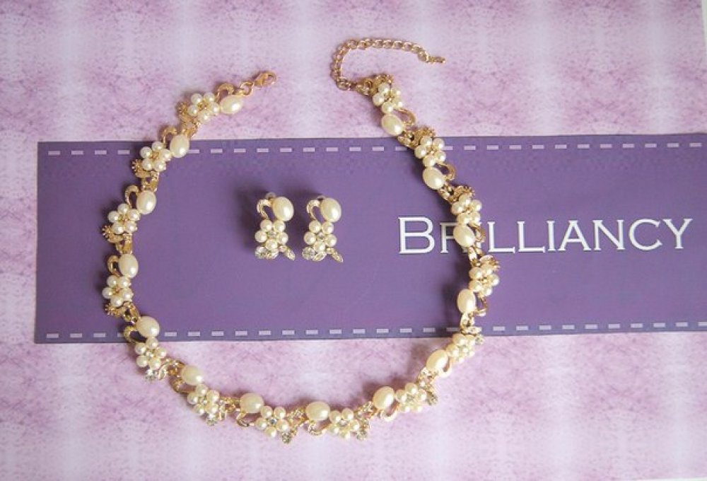 Набор с родиевым покрытием (белое золото 725 пробы)и жемчугом в золоте