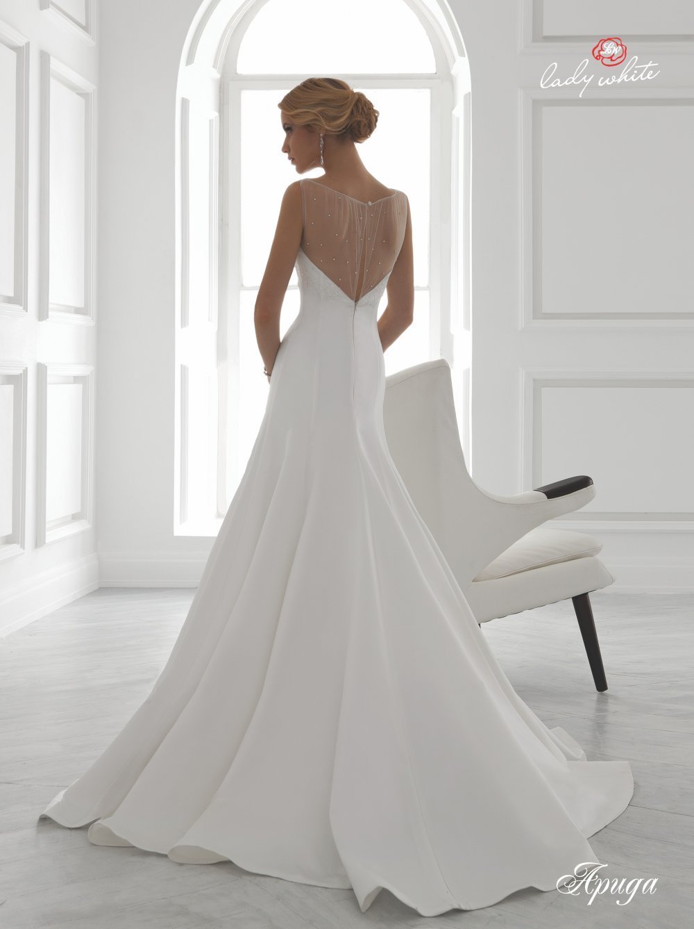 Платье свадебное "Lady White Universe Арида" - это оригинальность сочетания тканей и силуэтов, это то, о чем мечтает каждая невеста. 
Элегантность, нежность, изысканность в сочетании с королевской статью и скрытой страстью - это и есть образ "Lady White Universe Арида". 
Ткань: атлас, сетка эластичная, гипюр глад.