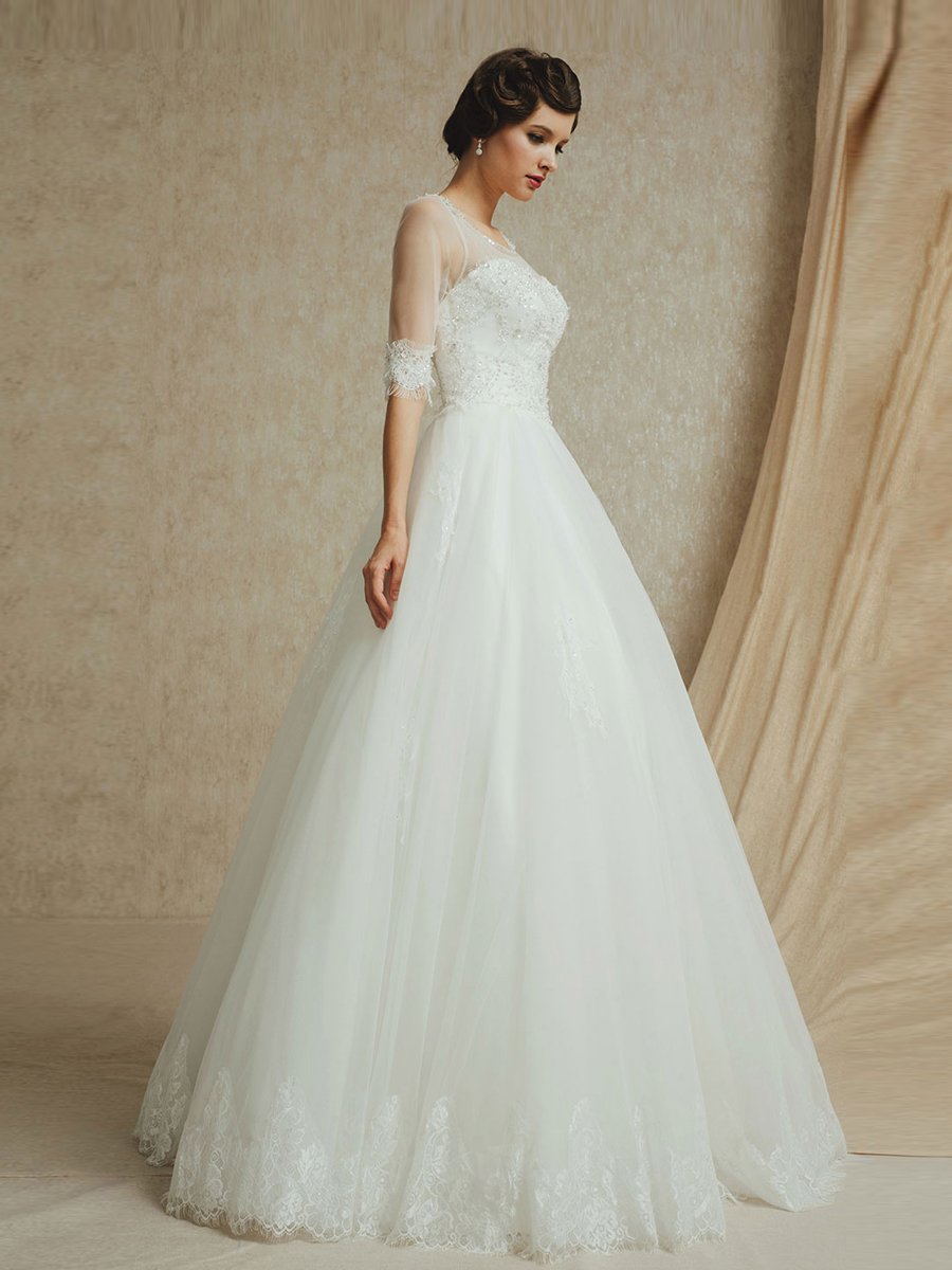 http://www.topwedding.ru/sheer-half-sleeves-tulle-wedding-dress-with-beaded-bodice-and-appliqued-hem-ru-hs140109012.html