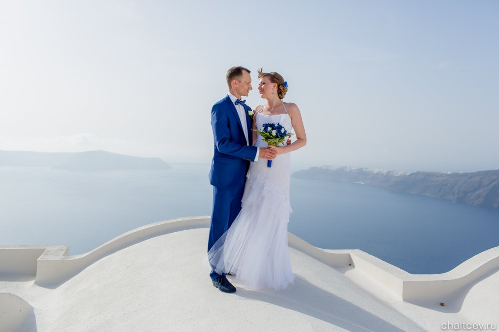 Официальная свадебная церемония Екатерины & Владислава из г. Тюмени 22.09.2014 года в Греции на о. Санторини. Свадебная площадка Andromeda villas