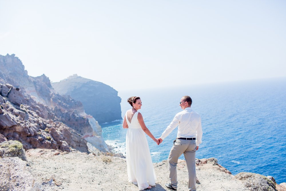 Свадебная церемония Яны & Алексея из Тучково 24.07.2014 года в Греции на о. Санторини, свадебная площадка Andromeda Villas