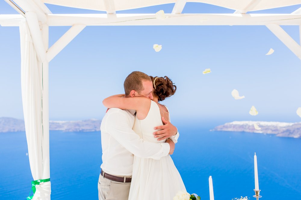 Свадебная церемония Яны & Алексея из Тучково 24.07.2014 года в Греции на о. Санторини, свадебная площадка Andromeda Villas