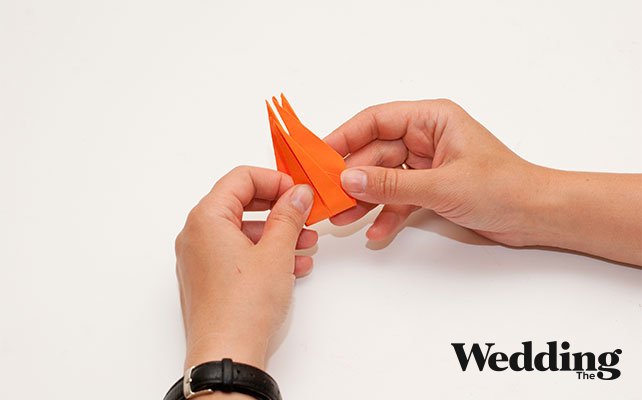 нижние уголки загнуть к верху заготовки