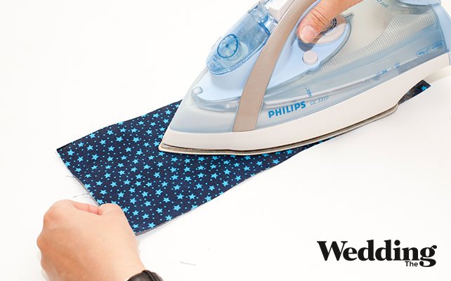 прогладить ткань утюгом