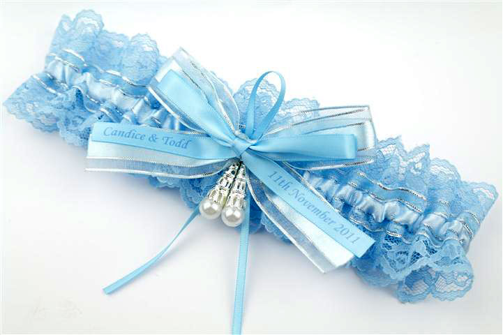 подвязка с именами молодоженов