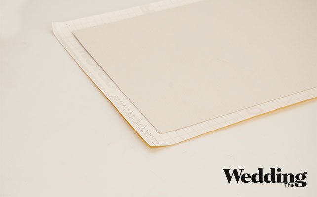 вырезать прямоугольник из картона, отразеть самоклеящуюся пленку на 2 см больше